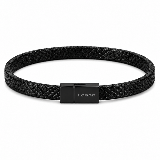 Black woven bracelet with a black clasp on a white background
