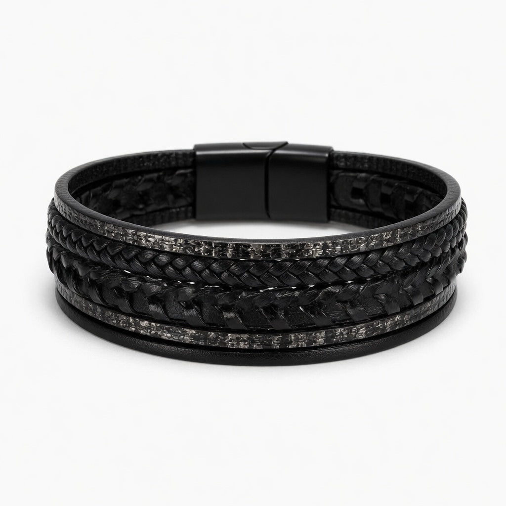 Multi-layer black men's bracelet featuring braided leather and textured industrial steel strands with a matte black magnetic clasp.