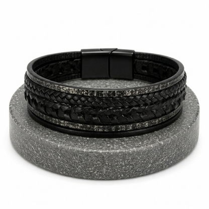 Modern industrial style men's bracelet with a multi-strand leather and metal design, perfect for a rugged-refined look.