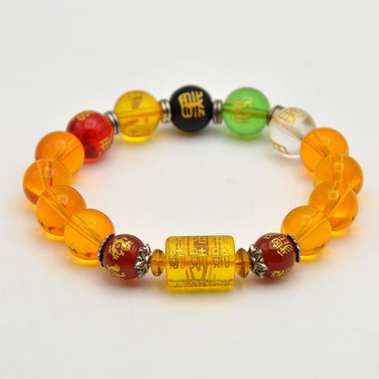 A colorful bracelet with a mix of round and square beads, featuring prominent orange beads and others in red, green, yellow, and black, with Chinese characters inscribed on some of the beads.